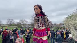 Giant puppet, global symbol of human rights Little Amal draws massive crowd while walking through Hampstead Heath, London