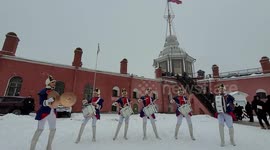 Women drum group play music at funny festival in St Petersburg, Russia