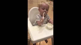 Adorable baby boy has 'choice words' to express his excitement while learning to eat