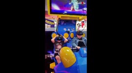 Mom and son scream their hearts out while enjoying a VR sled ride