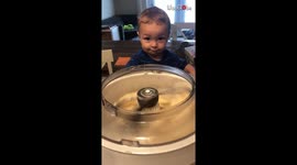 Passionate kid is IN LOVE with the sight of sourdough being made with a mixer