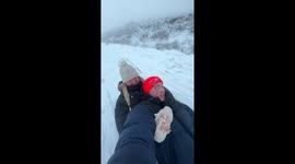 Couple in fits, awe & fear during a fast-paced sledding adventure in Ireland