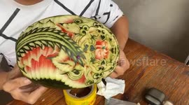 Talented chef sculpts incredible 3D-looking flower garden on watermelon