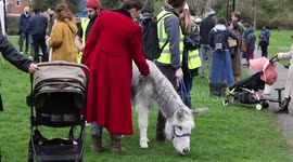 Columbia Road flower market gives way to Palm Sunday procession led by donkey