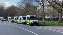 Long line of Police vans at Londons Speakers’ Corner for the “Let Women Speak Rally”