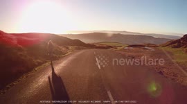 Early morning lonely walker captured on dash cam while driving over the Nick O' Pendle on Pendle Hill