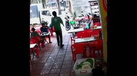 Man loses control of his scooter and crashes into café in Bali, Indonesia