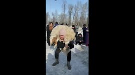 'Sheep squatting': Russian woman wins unusual contest with 50-kilogram animal on her shoulders