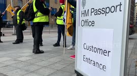 Members of the PCS Union on a picket line outside a passport office in east london