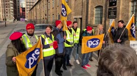 Members of the PCS Union on a picket line outside HM Passport Office in East London