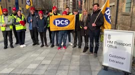 Members of the PCS Union on a picket line outside HM Passport Office in East London