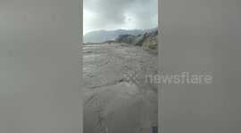 Mudflow gushes down volcano slopes in Indonesia's East Java
