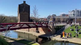 People enjoy the sunshine as spring arrives in London