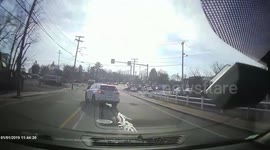 Close Call: Confused Driver Randomly Decides to Change Lanes Into Oncoming Traffic