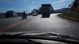 Close Call: Motorcyclist's Blind Spot Nearly Results in a Collision With Oncoming Car