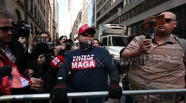 Trump supporter in MAGA hat defends former president outside Trump Tower