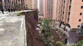 Residents evacuated as mud wall collapse damages building in southern China