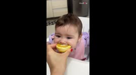 Adorable baby tries orange for the 1st time and she has mixed peelings about it