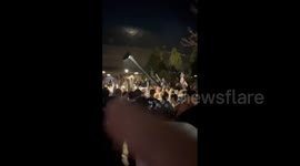 Mayhem! University students knock down lamp post in Storrs, US