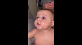 Baby's precious bathtime moments are a splash of cuteness