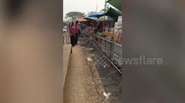 Barbed wire rolls keep food stalls secured along Thai-Myanmar border