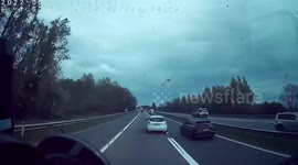 Close Call: White Renault Recklessly Changes Lanes While a Car is Right Beside It