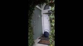 Surprising grandparents with their grandbaby on the front doorstep