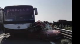 Coach smashes into car that stopped on a motorway