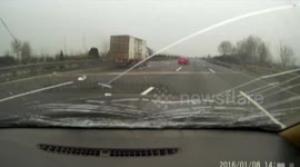 A truck collides a car parking on highway