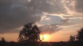 Sunset, clouds and Moon time-lapse