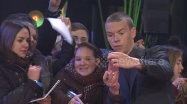 Will Poulter takes selfies with fans at The Revenant premiere