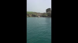 Spear fishing for plaice off St Anthony's head near St Mawes Cornwall