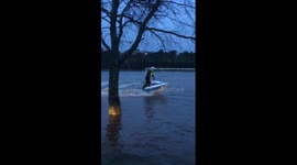 Amazing footage of jet skier doing tricks on a flooded football pitch