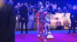 R2D2 and C3PO walk the red carpet