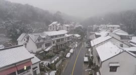 Beautiful aerial footage of snow-covered town in China