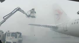Removing the ice and snow on airplanes by taking