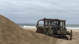 Army corps of Engineers prep beach prior to massive nor'easter