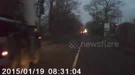 UK driver narrowly avoids crashing into lorry as it pulls out