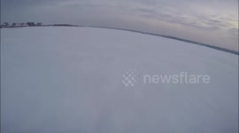 Sunken snowmobile retrieval  from under ice Part 1
