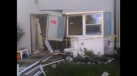 Man nearly killed after his  brother drives car into house