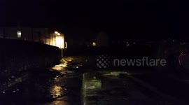 Storm waves on the river  tamar  plymouth 2 ft waves battering the river bank