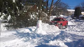 Pick-up truck utterly destroys snowman
