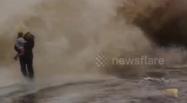 Huge waves catch Wirral sightseers unaware