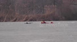 Woman and two-year-old rescued after falling through ice on frozen Slovenian lake