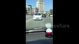Driving backwards at 60mph on a busy road