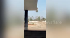 Flying tent crashes on roof during windy weather