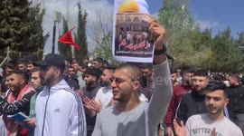 Palestinian students from Birzeit University take part in a protest in support of Al-Aqsa Mosque in the West Bank city of Ramallah