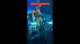 Rapper YG invites up then passes on fan during live concert in Portland