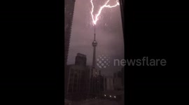 Moment lightning strikes Toronto's CN Tower caught on camera