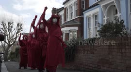 Street mime artists lead silent vigil to protest felling of 123-year-old tree